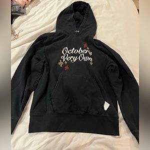 OVO hoodie. size large. color black. defect in front